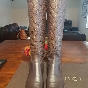Women's brown leather Gucci riding Boots.